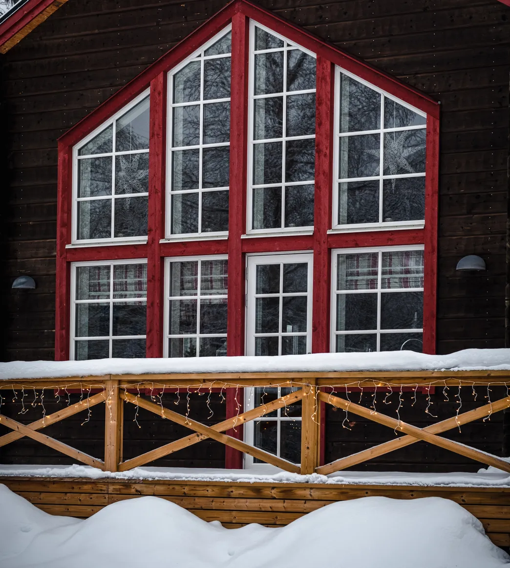 Red home in the snow